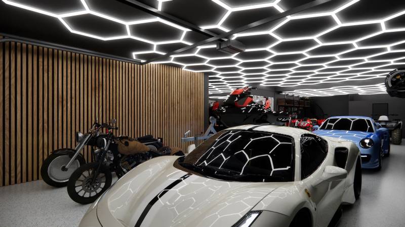 Geschäftsräume mit Autos, Motorrädern und einzigartiger Deckenbeleuchtung in der Garage.