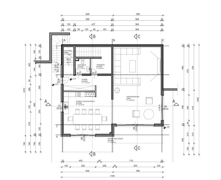 Grundriss einer Villa mit Küche, Esszimmer, Badezimmer und Wohnzimmer.