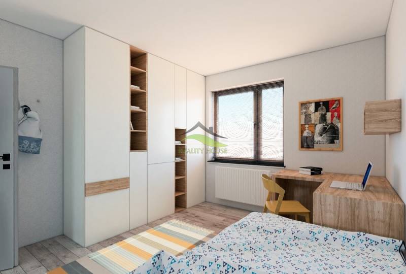 Kinderzimmer im Einfamilienhaus mit Aufbewahrungsschränken und Schreibtisch.