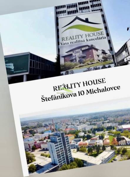Blick auf das Gebäude Reality House, Büro Michalovce, Einfamilienhäuser im Hintergrund.
