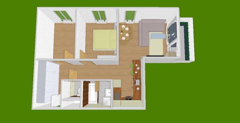 Grundriss einer 3-Zimmer-Wohnung mit Küche, Wohnzimmer, Badezimmer und zwei Schlafzimmern.