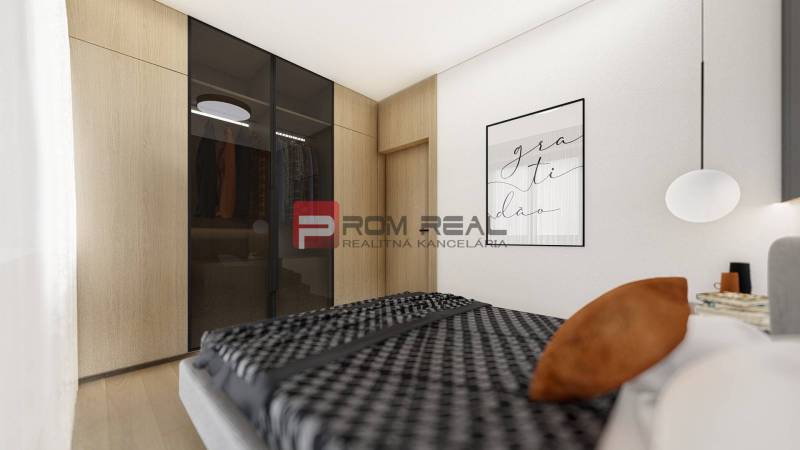 Schlafzimmer in einer 2-Zimmer-Wohnung mit Bett, Kleiderschrank und dekorativem Bild.
