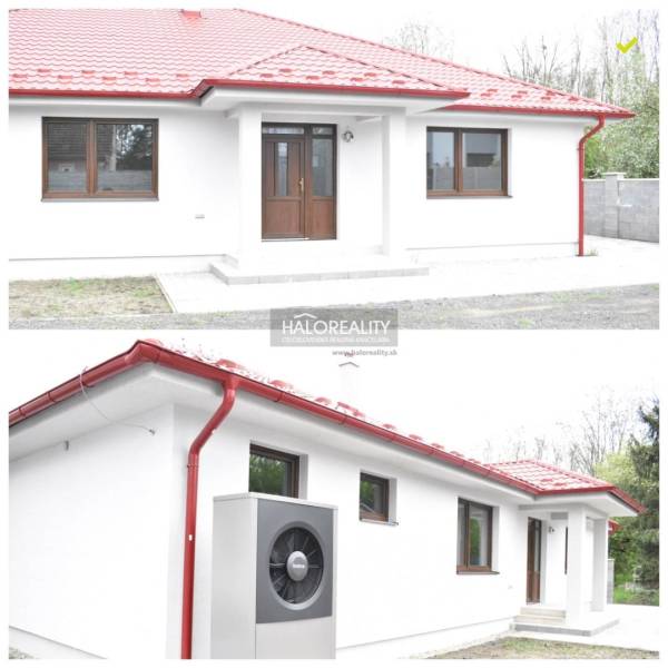 Ein Einfamilienhaus in Závod mit heller Fassade und rotem Dach, geeignet für energieeffizientes Wohnen.