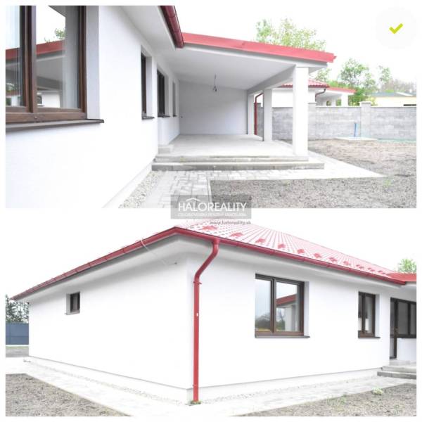 Das Einfamilienhaus in Závod präsentiert eine weiße Fassade mit einem roten Dach und einem Unterstand.