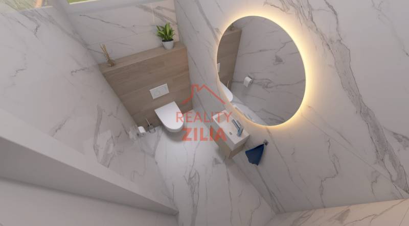 Badezimmer mit rundem Spiegel, Sanitäranlagen und dekorativen Fliesen in einem Einfamilienhaus.