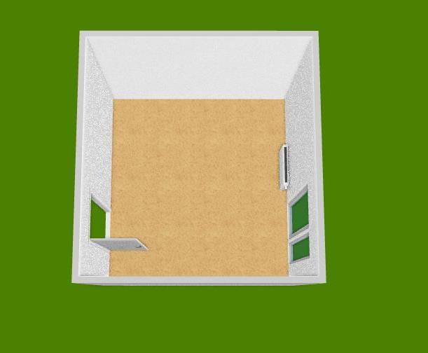 Ein Zimmer mit Holzboden und weißen Wänden im Büro.