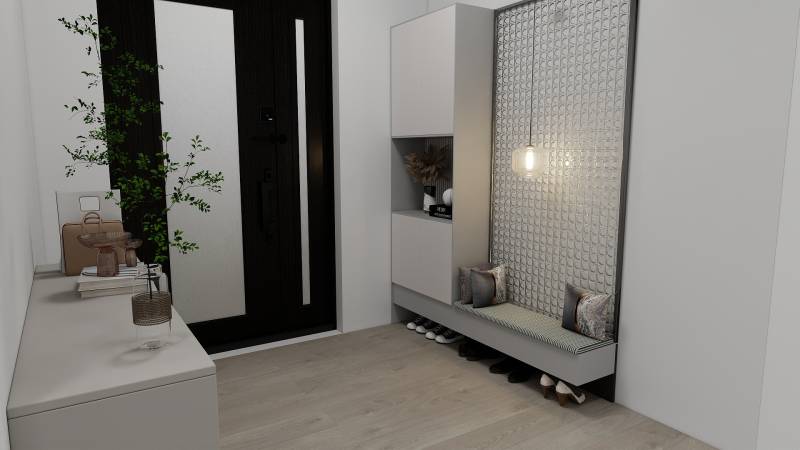 Innenraum eines Einfamilienhauses mit Holzboden, Eingangsbereich mit Sitzgelegenheit und Stauraum.