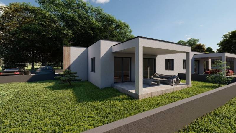 Ein Einfamilienhaus in Žihárec mit Terrasse und Garten, umgeben von Grün und Autos.