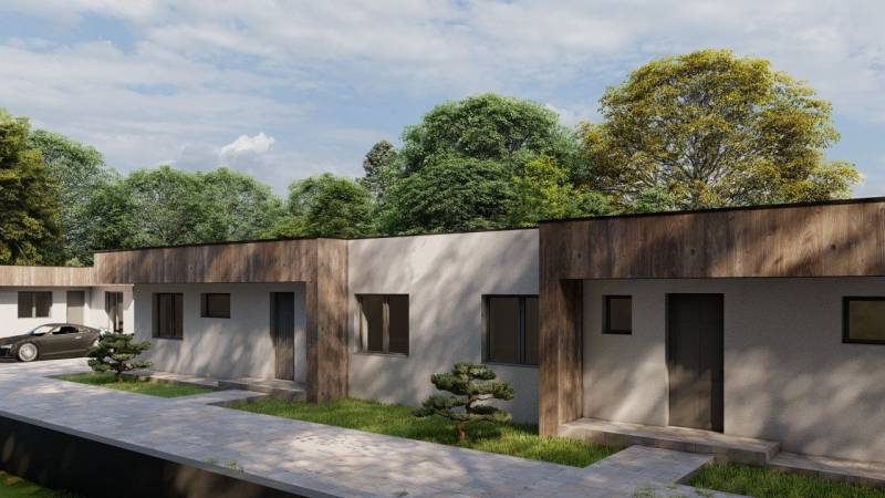 Ein Einfamilienhaus in Žihárec mit einem zusammenhängenden grünen Garten und einem nahtlosen Übergang des Gehwegs.