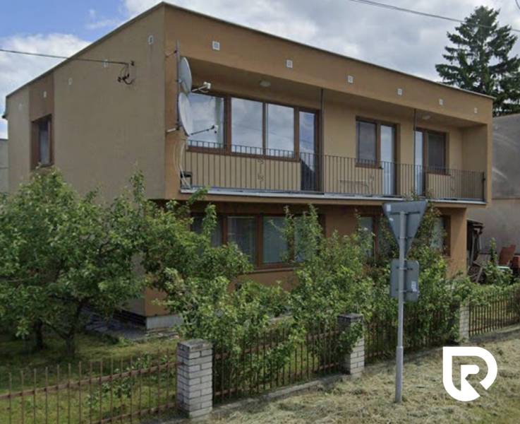 Einfamilienhaus in Ducové in der Straße Ducové 40 mit Garten und Balkon.