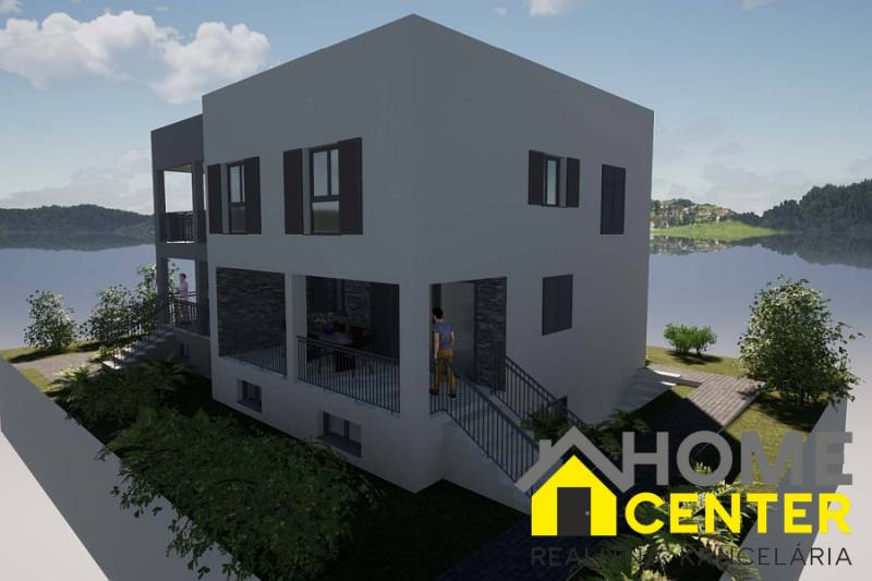 Ferienwohnung in Čiovo mit Meerblick und umgebendem Grün.