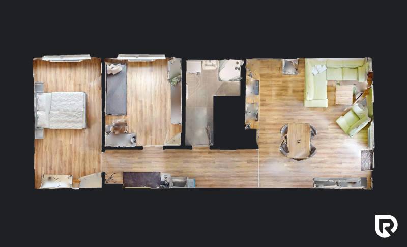 Grundriss einer 3-Zimmer-Wohnung mit Holzboden, Küche und Wohnzimmer.