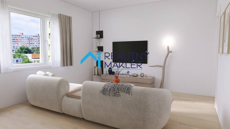 Wohnzimmer in einer 3-Zimmer-Wohnung mit einem bequemen Sofa und einem Fernseher an der Wand.