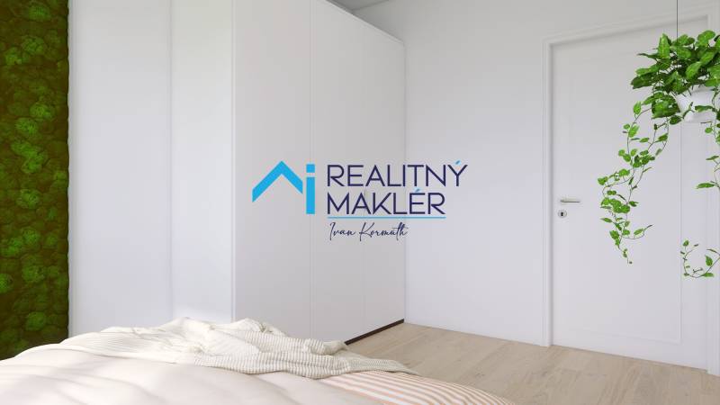 Schlafzimmer mit weißem Schrank, grüner Wand und Pflanzen in einer 3-Zimmer-Wohnung.