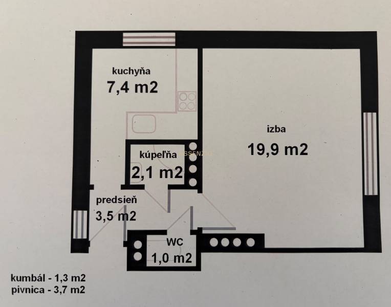 Grundriss einer Einzimmerwohnung mit Küche, Badezimmer, WC und Flur.