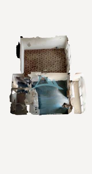 Der Grundriss zeigt die Zimmer einer Einzimmerwohnung mit verschiedenen Bodendekorationen.