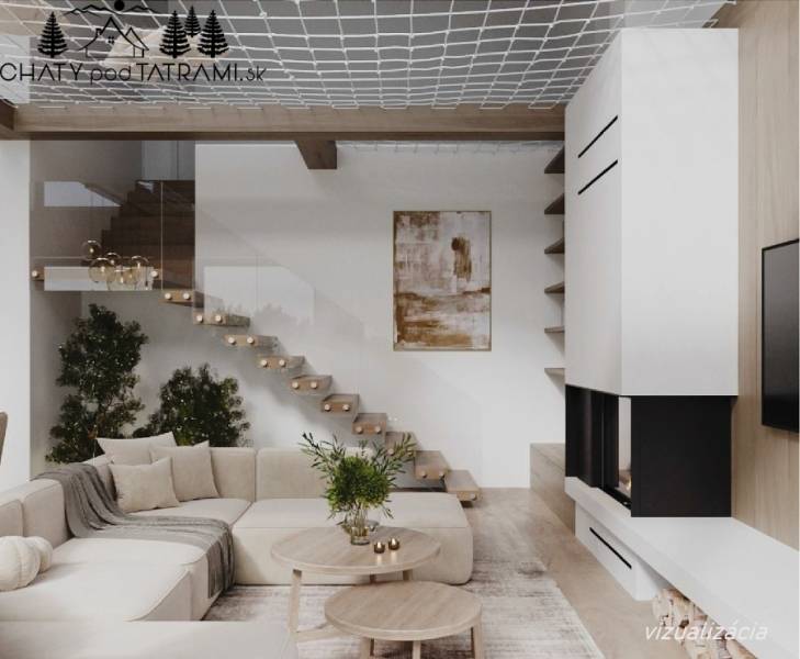 Helles Wohnzimmer in einer Hütte mit bequemer Couchgarnitur und Holzboden.