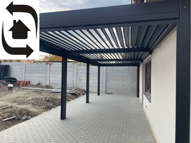 Das Einfamilienhaus in der Devätinova-Straße in Bratislava - Podunajské Biskupice hat eine Terrasse mit einer Pergola.