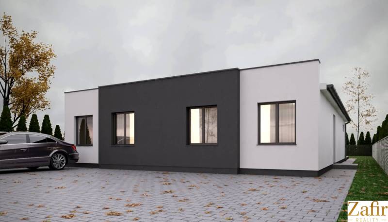 Ein Einfamilienhaus in Trnava mit weißer und dunkler Fassade, Pflastersteinen und einem geparkten Auto.