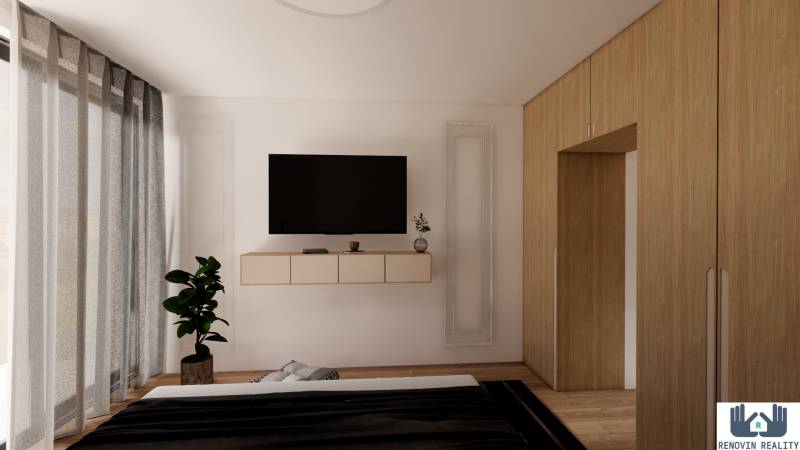 Schlafzimmer in einer 3-Zimmer-Wohnung mit Holzboden, Fernseher und Schrank.
