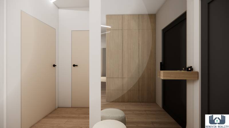 Flur einer 3-Zimmer-Wohnung mit Holzboden und minimalistischem Design.