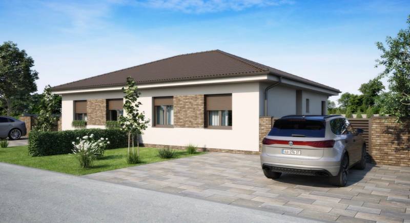 Ein Einfamilienhaus in Veľké Dvorníky mit Garten und Parkmöglichkeiten auf gepflasterter Fläche.