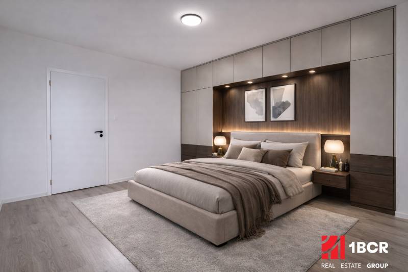 Schlafzimmer in einer 3-Zimmer-Wohnung mit Teppichboden, Holzbodenoptik und Einbauschränken.