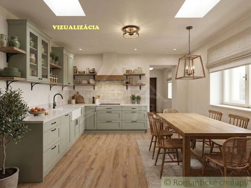 Innenraum eines Einfamilienhauses mit Küche, Holzelementen und Küchentisch mit Lampe.