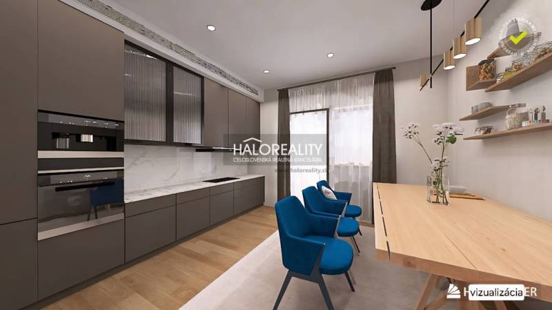 Moderne Küche in einer 4-Zimmer-Wohnung mit stilvollen Möbeln und einem Holzboden.