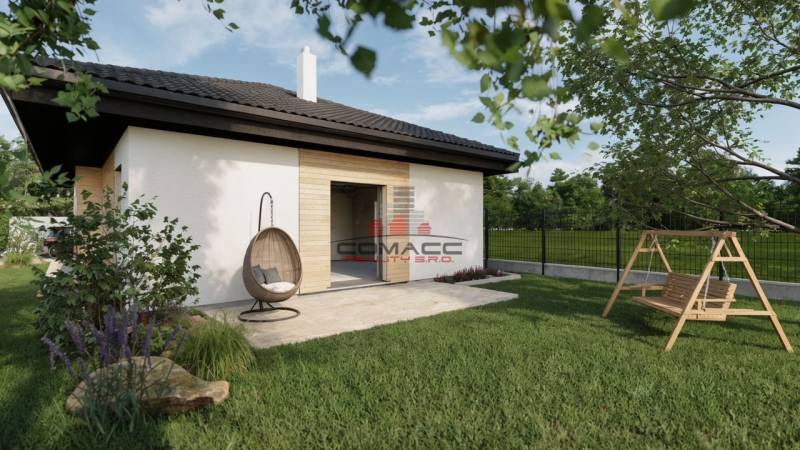 Ein Einfamilienhaus in der Kostolná-Straße in Drahovce mit Terrasse, Schaukel und Garten.