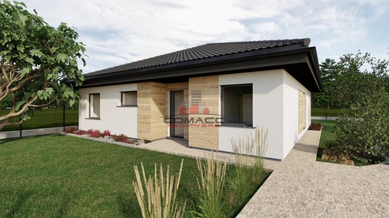 Einfamilienhaus in der Kostolná-Straße in Drahovce mit Rasen und gepflegtem Garten.