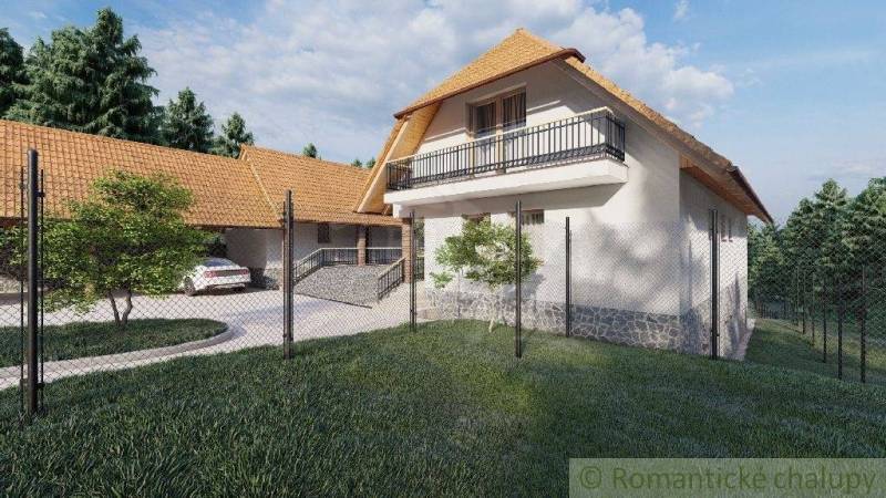 Ein Einfamilienhaus in Šiatorská Bukovinka mit Satteldach, Balkon, Garage und Umzäunung.