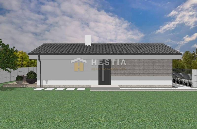 Ein Einfamilienhaus mit moderner Fassade und Dach, umgeben von Grünflächen und einem gepflegten Garten.