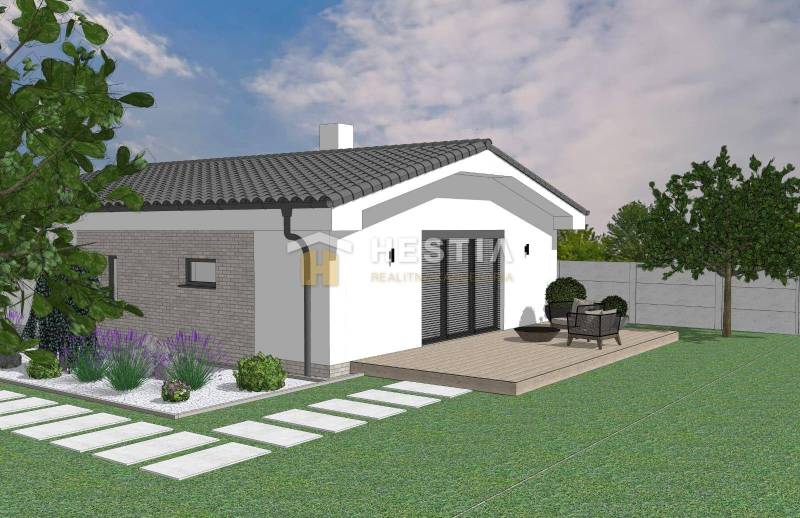 Ein Einfamilienhaus in Sekule mit einer Terrasse, umgeben von Grün und einem Garten.