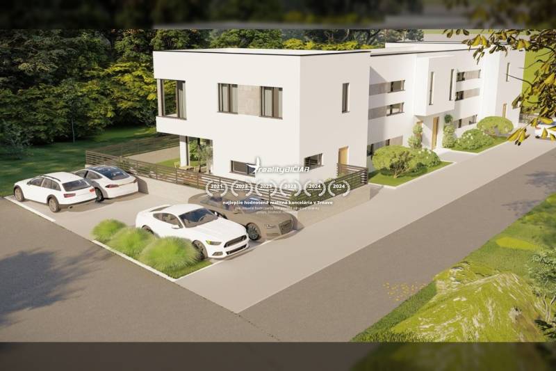 Ein Einfamilienhaus in der Straße in Nin, mit Parkplatz für vier Autos und einem Garten.