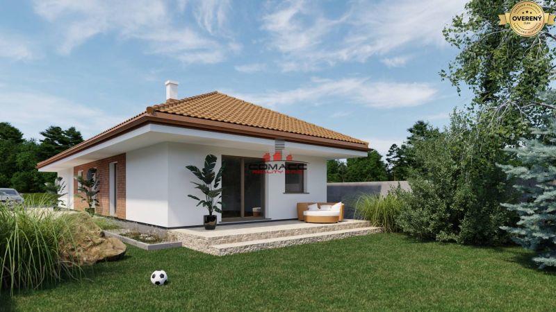 Ein Einfamilienhaus in Veselé in der Straße Veselé mit einem Gartenbereich und Rasen.