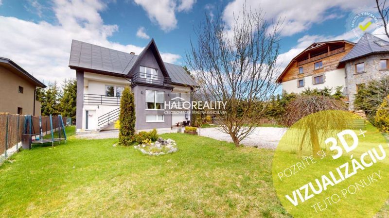 Ein Einfamilienhaus in Vitanová mit einem schön gepflegten Garten und Blick auf die umliegenden Häuser.