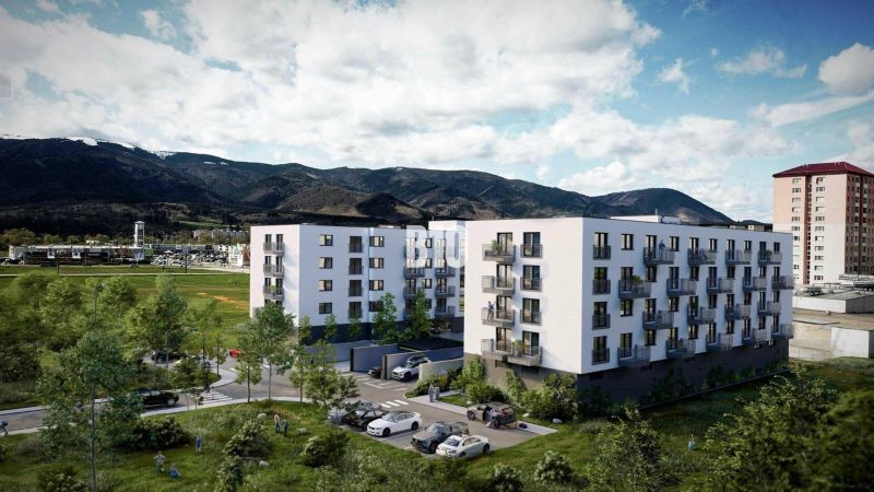 Neubau in der Košútska-Straße in Martin, umgeben von Grünflächen und Bergen.