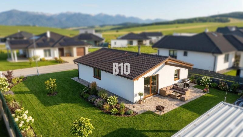 Einfamilienhaus in Diaková mit großem Garten und Terrasse, im Hintergrund Berge.