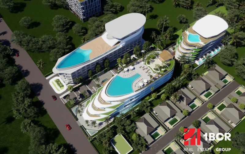 Visualisierung des Wohnungsbaus in Phuket: Mehrstöckige Gebäude mit Pools, umgeben von Grünflächen und einer Straße.