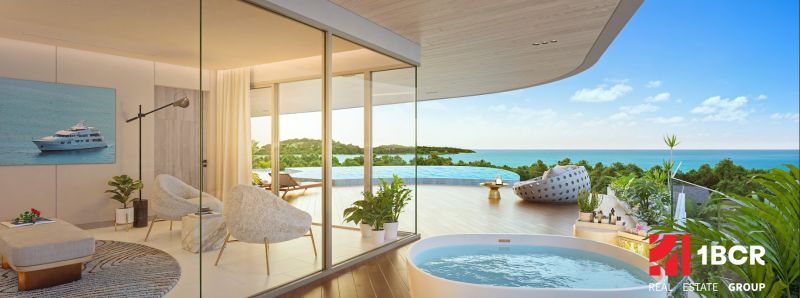Elegantes Interieur mit Blick auf die Terrasse, den Pool und den Ozean, Wohnungsbau.
