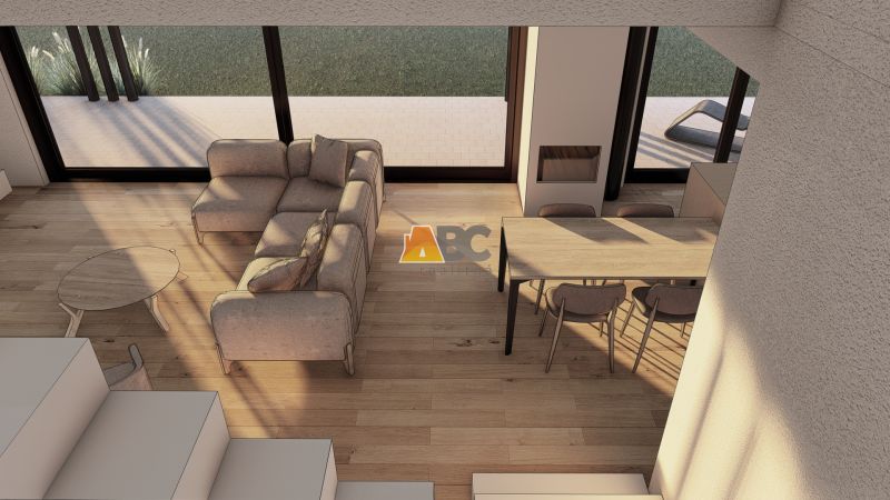Innenansicht eines Wohnzimmers mit Sofa, Couchtisch und Holzdekorboden.