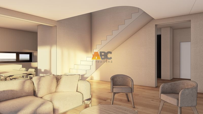 Wohnzimmer mit Holzboden, Treppe und bequemen Sitzgelegenheiten.