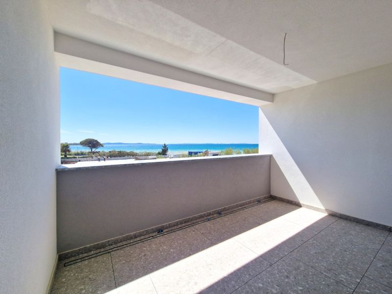 Blick vom Balkon einer 3-Zimmer-Wohnung auf die Küste in Privlaka.