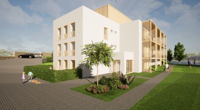 Ein Gebäude in Nová Lesná, umgeben von Grün, Teil von Hotels und Pensionen.