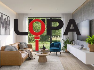 Wohnzimmer mit Holzboden, bequemer Couch und moderner Beleuchtung.