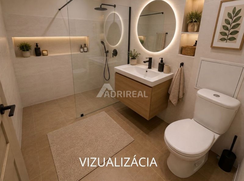 Modernes Badezimmer mit Holz, Duschkabine, beleuchtetem Spiegel und dekorativen Elementen in einer 2-Zimmer-Wohnung.