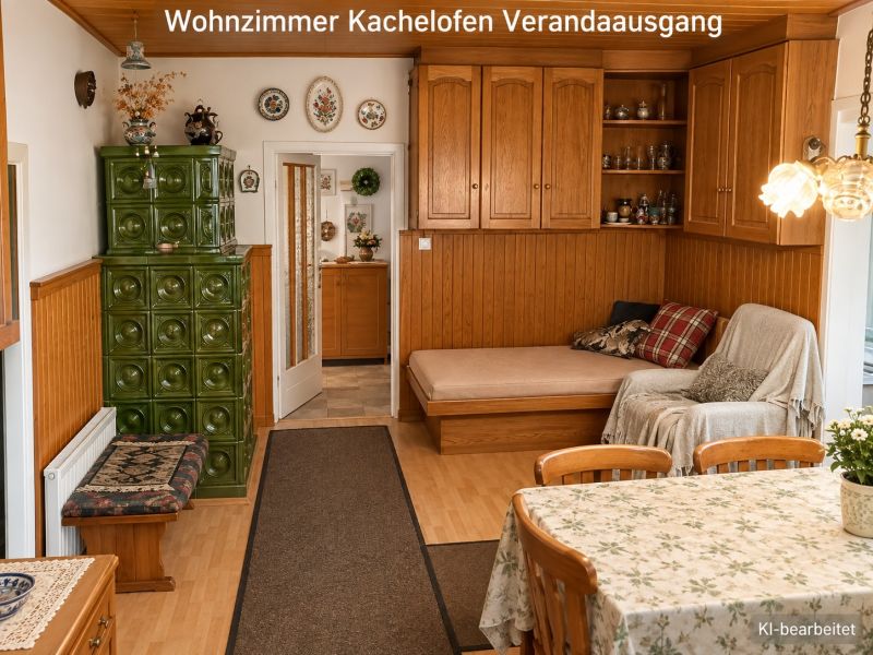 Wohnzimmer eines Einfamilienhauses mit Kachelofen und Holzelementen.