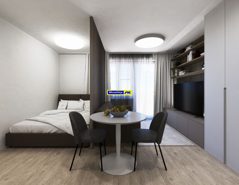 Interieur einer 3-Zimmer-Wohnung mit Bett, Esstisch und Fernseher.