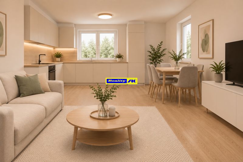 In der 4-Zimmer-Wohnung gibt es eine offene Küche mit einem Essbereich und einem Boden in Holzoptik.